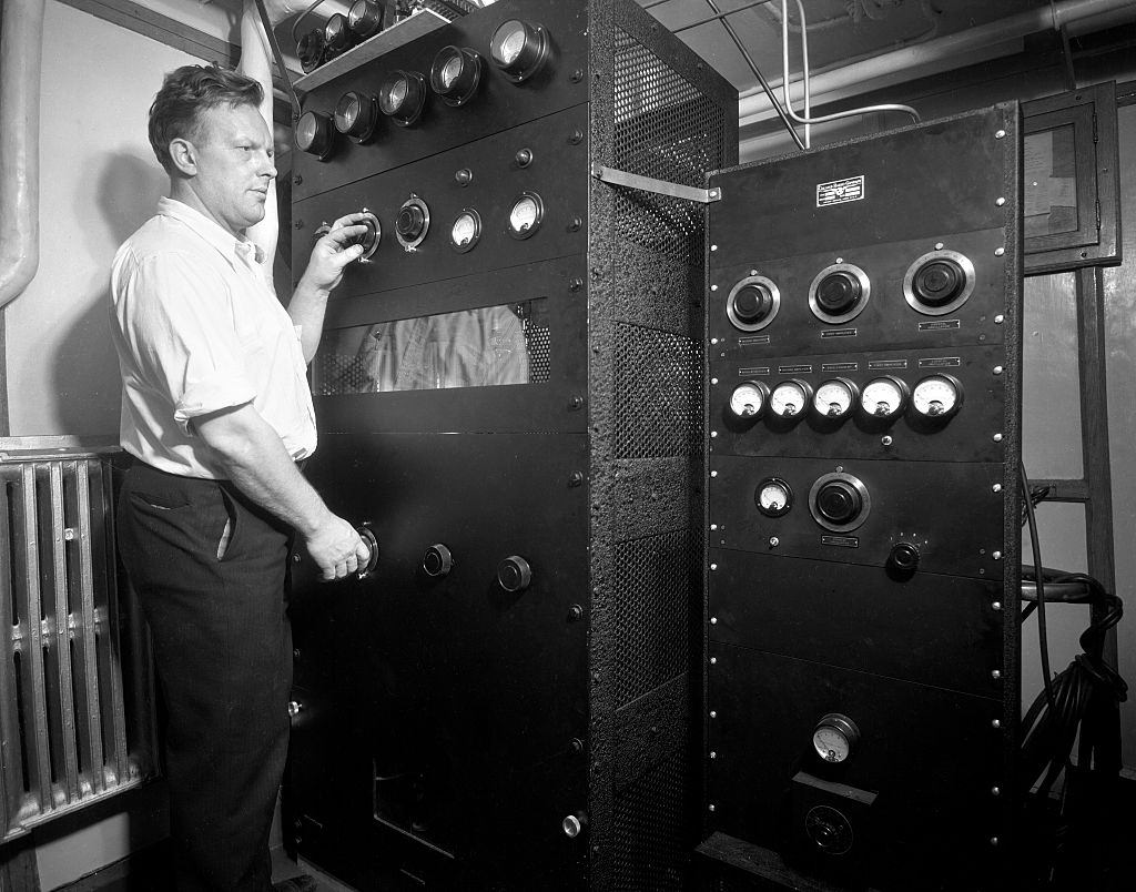 The United States Coast Guard cutter "Northland" broadcasts CBS Radio messages from on board, in Seattle harbor, 1930s.