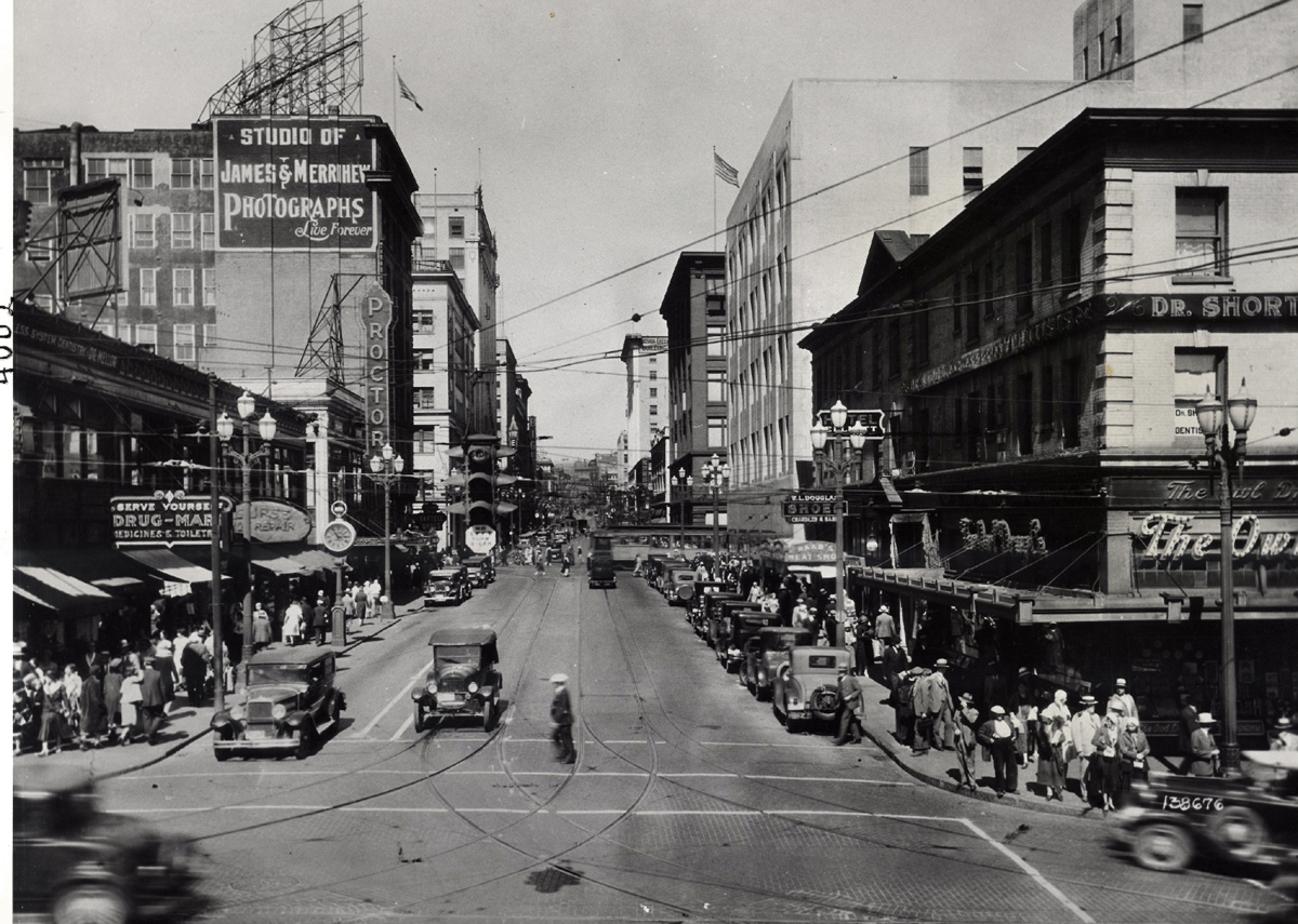 Looking up Pike Street from First Avenue, 1930