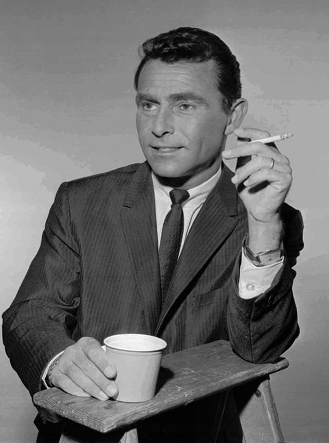 Rod Serling pauses for a cigarette and coffee between scenes during filming of "The Twilight Zone" in this 1961 photo.