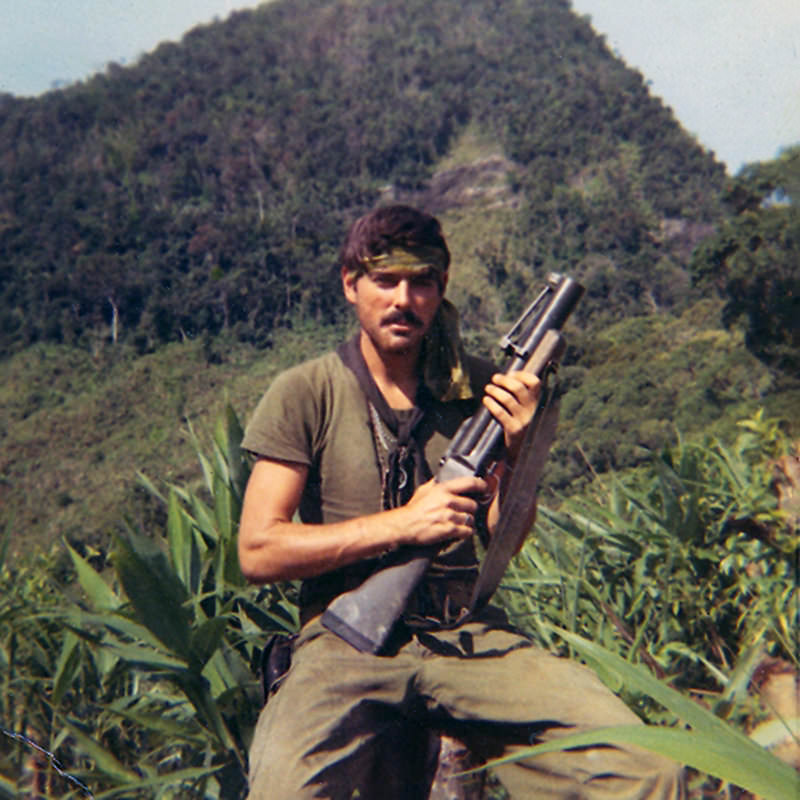 Michael Patrick Eltrich in trees in the mountains west of L.Z. Stinson. June 11, 1970.