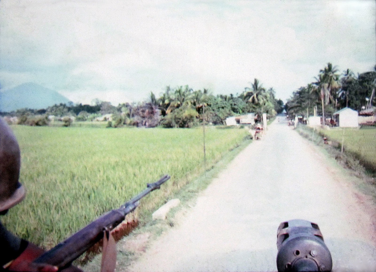 Taken while on a mission, with Black Virgin Mountain in view on the left. Cambodia.