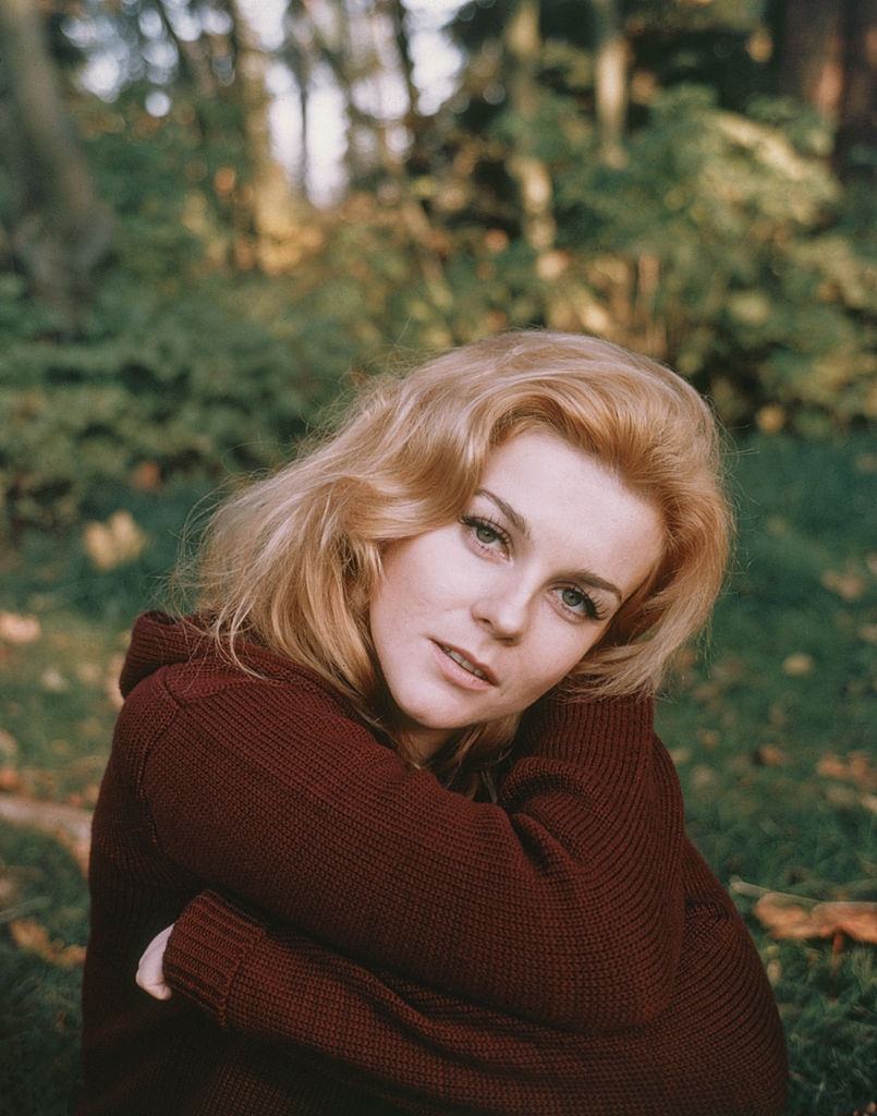 Ann-Margret relaxing in her garden, 1965.