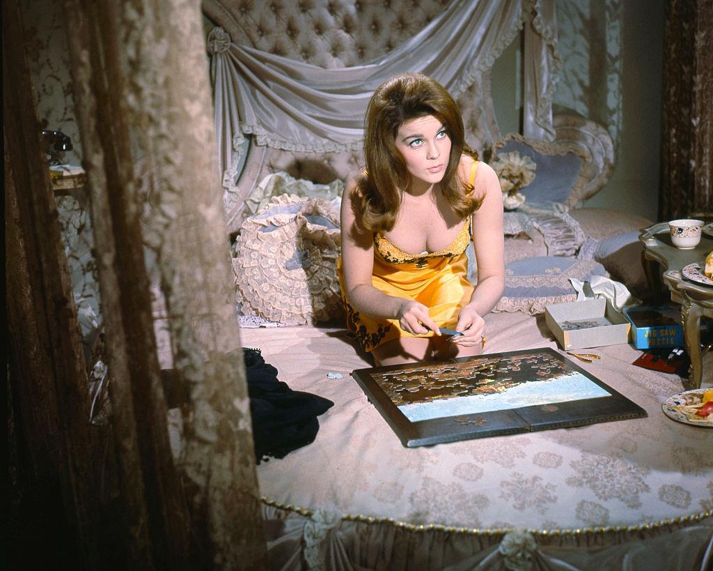 Ann-Margret completes a jigsaw puzzle in 'The Cincinnati Kid', 1965.
