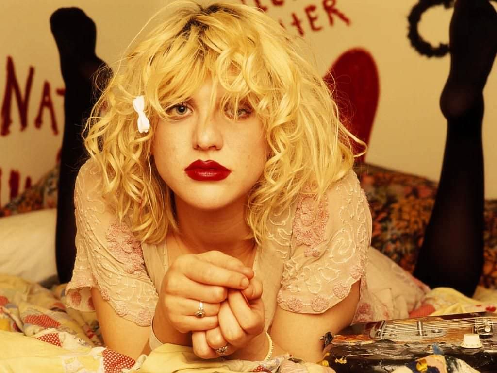 Young Courtney Love in a Cream-Colored Dress