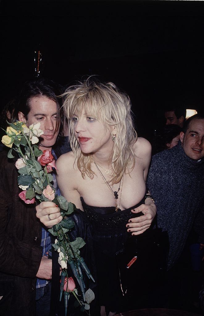 Courtney Love receiving flowers