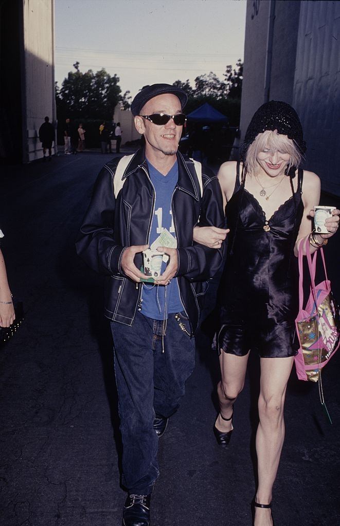 Courtney Love with Michael Stipe.