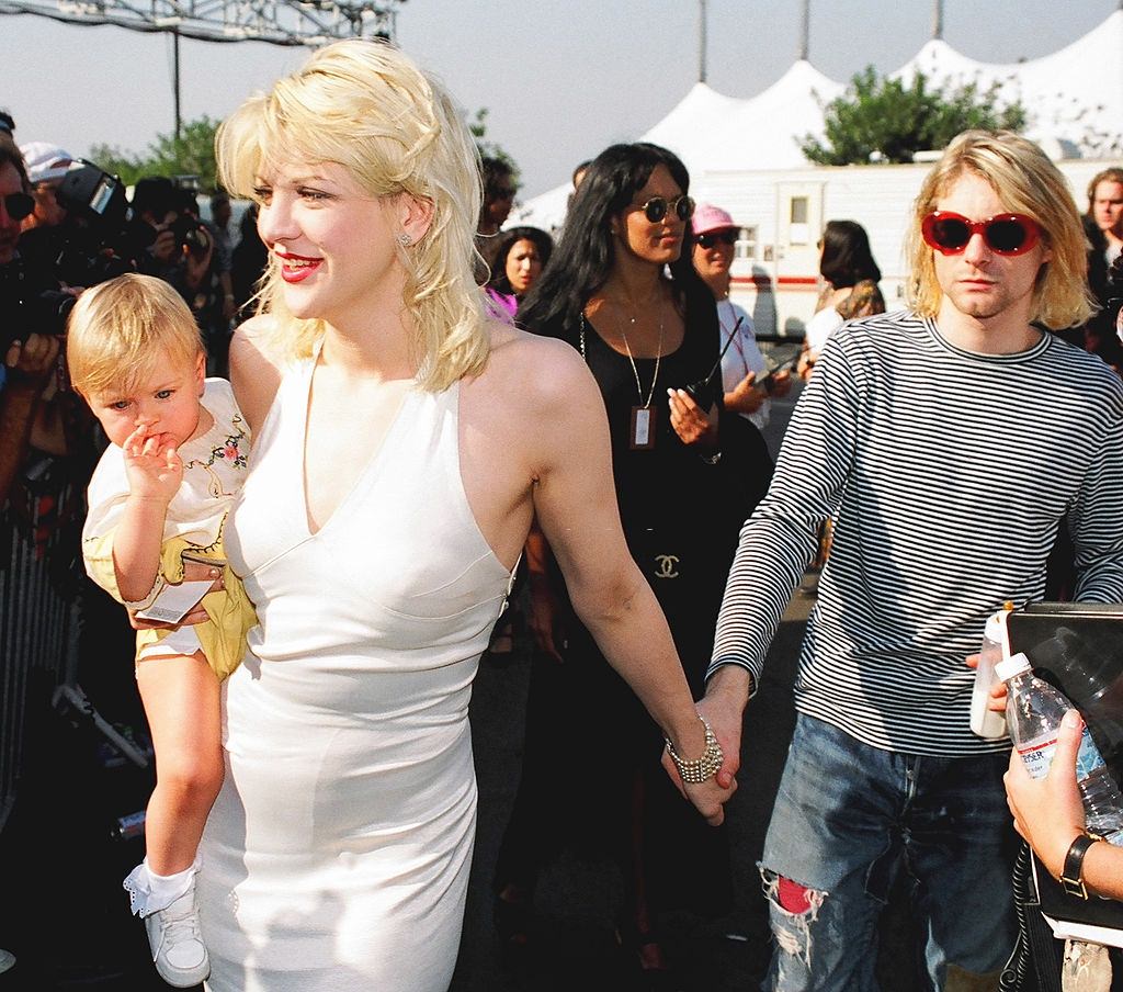 Courtney Love with her husband and daughter.