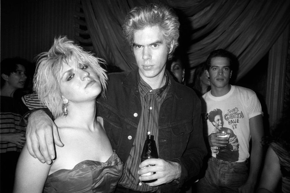 Courtney Love with Jim Jarmusch at the Sid and Nancy film party at the Puck Building, 1986.