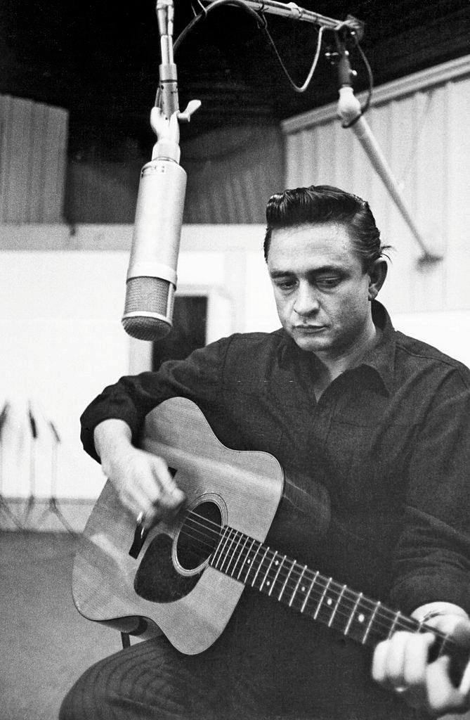 Johnny Cash recording in the studio in 1960.