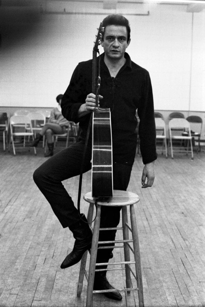 Johnny Cash poses for a portrait on the set of 'The Jimmy Dean Show', 1964.