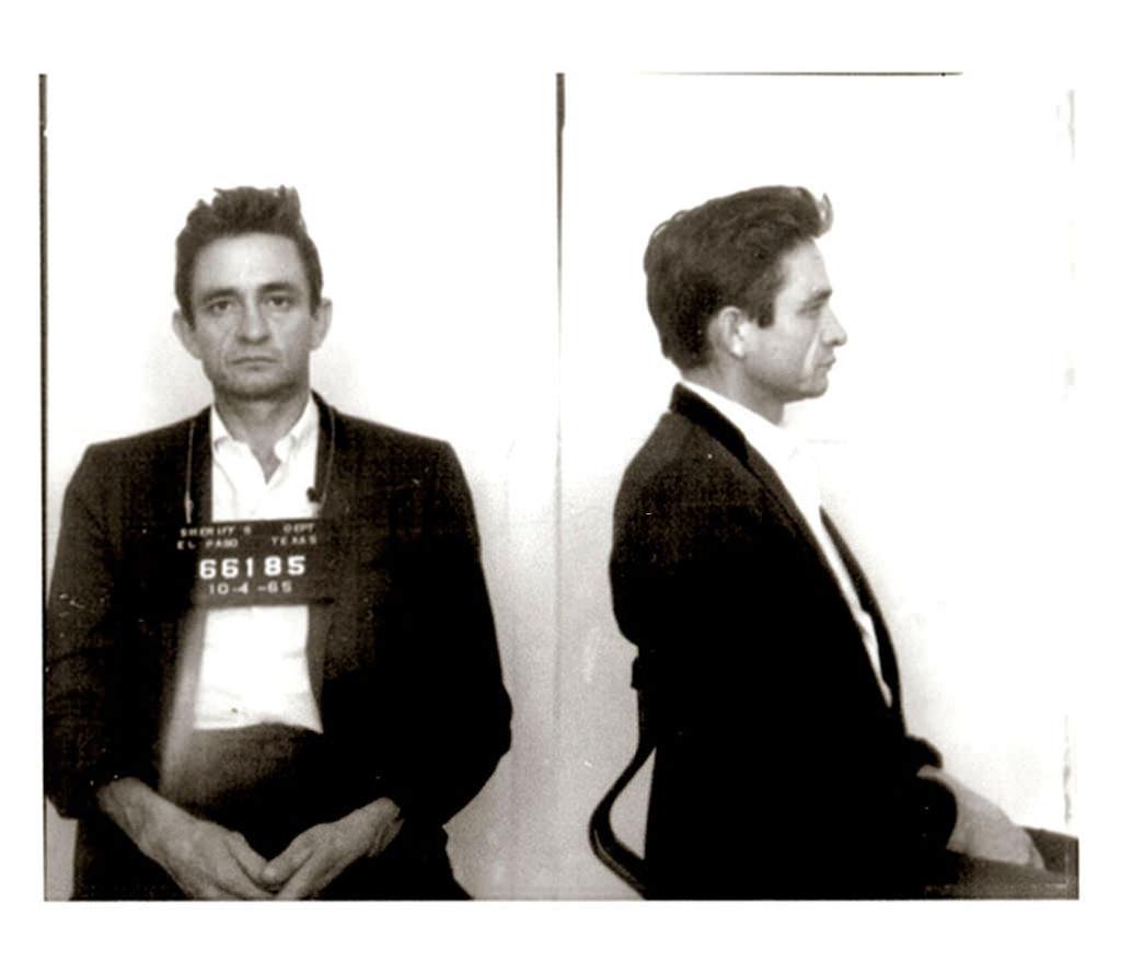 Mug Shot of Johnny Cash, He was arrested after U.S. Customs agents found hundreds of pep pills & tranquilizers in his luggage, 1961.