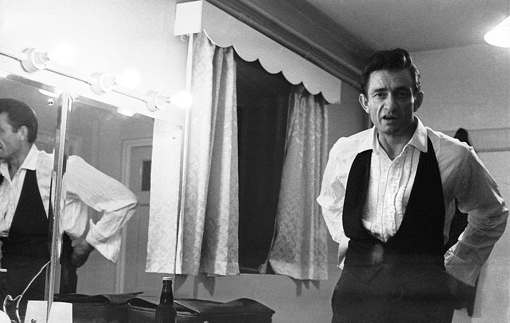 Johnny Cash backstage in dressing room, 1966.