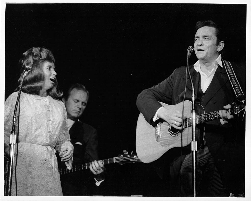 Johnny Cash and June Carter Cash perform onstage in Los Angeles, 1968.