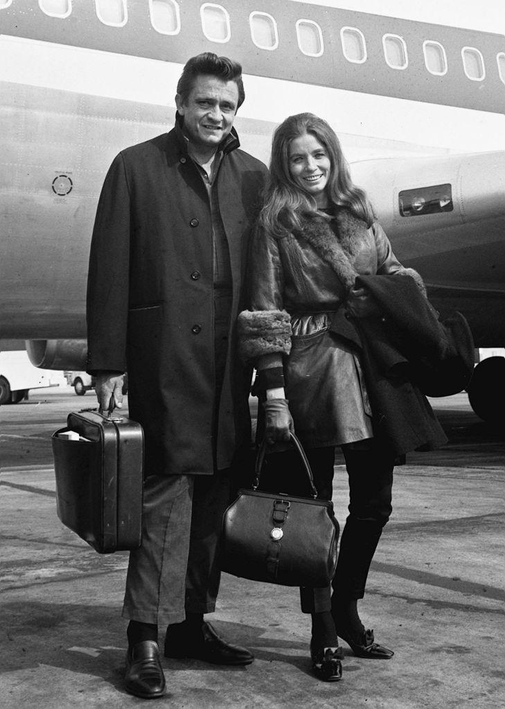 Johnny Cash with his wife June Carter Cash at Heathrow Airport, London.