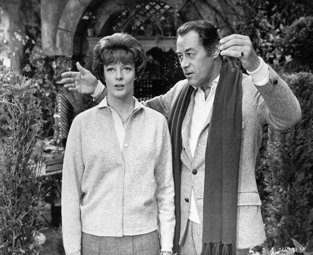 Maggie Smith with Rex Harrison in a scene from the film 'The Honey Pot', 1967.