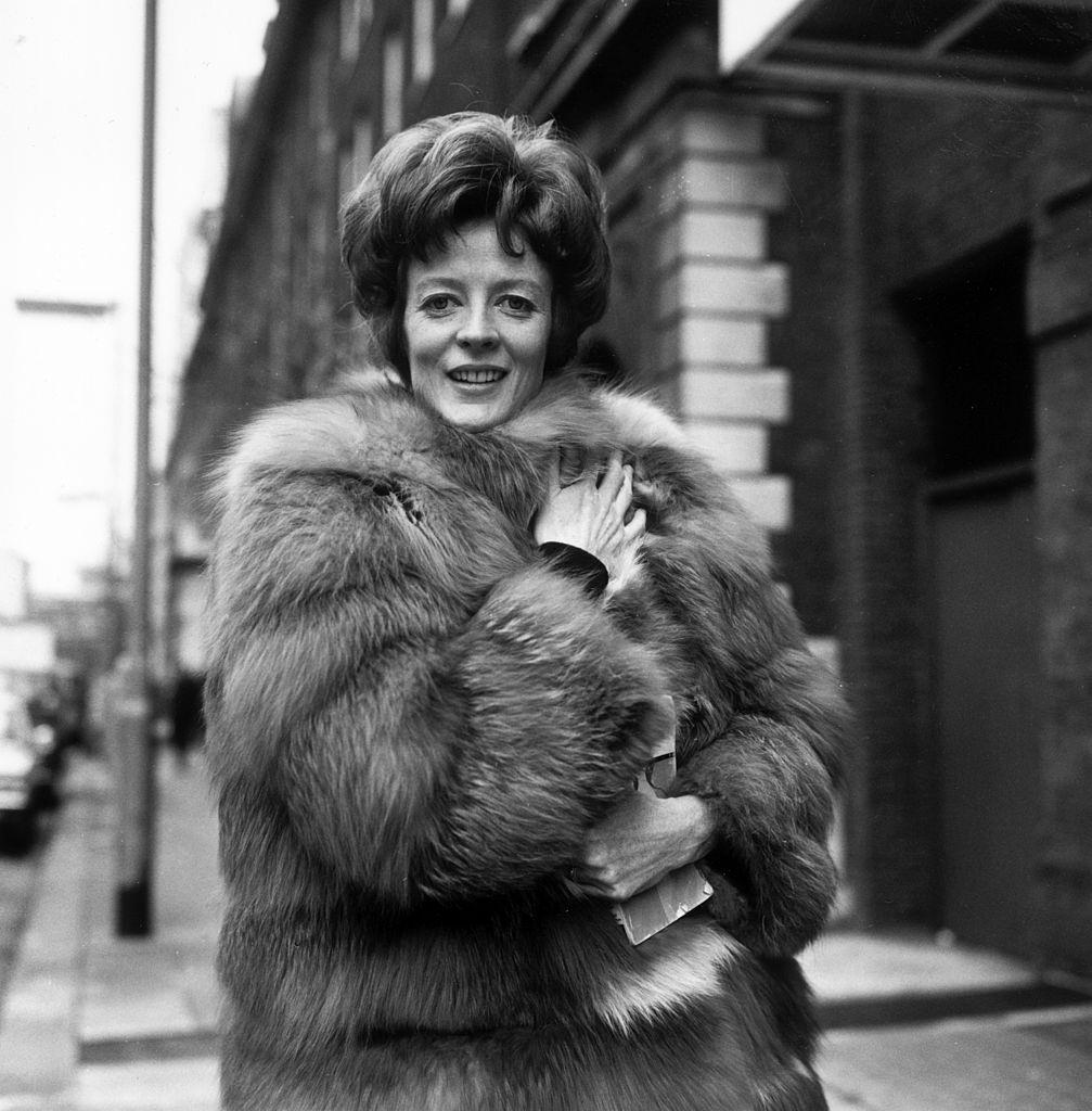Maggie Smith, wearing a fur coat, 1969.
