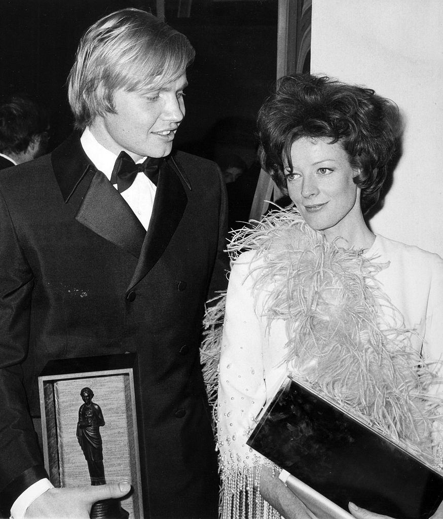 Maggie Smith with actor Jon Voight at the London Palladium, 1970.