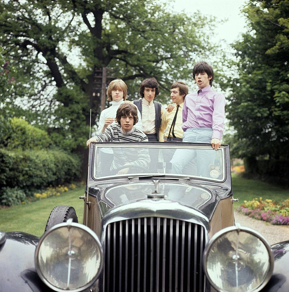 Mick Jagger with the members of rolling stones, 1964.