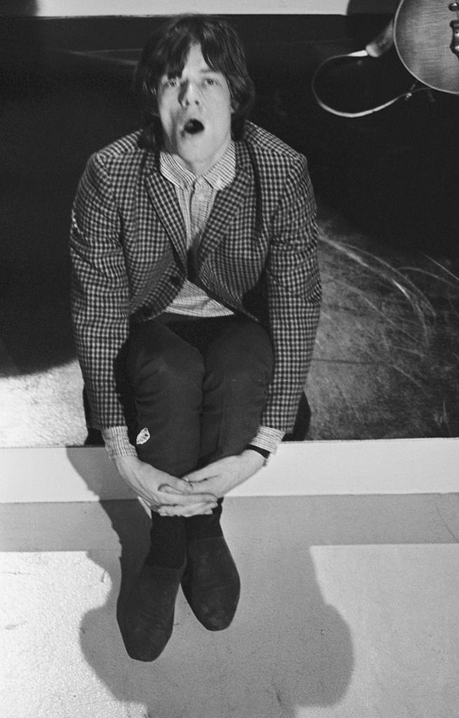 Mick Jagger looks bored during rehearsals for ABC's 'Thank Your Lucky Stars' TV pop music show, 1964.