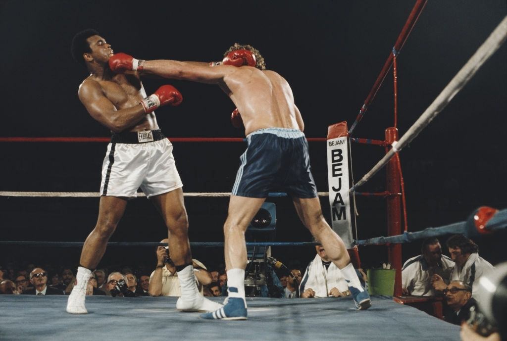 Muhammad Ali fighting against British boxer Joe Bugner during their heavyweight fight at Las Vegas Convention Centre, 1973.