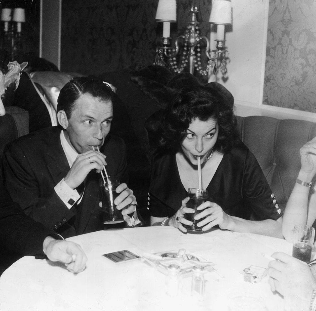 Frank Sinatra and Ava Gardner enjoying the drinks.