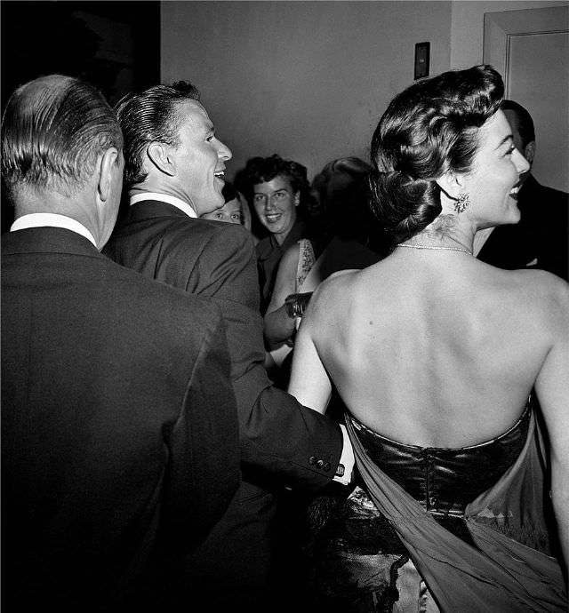 Frank Sinatra and Ava Gardner attending a black-tie event, 1953.