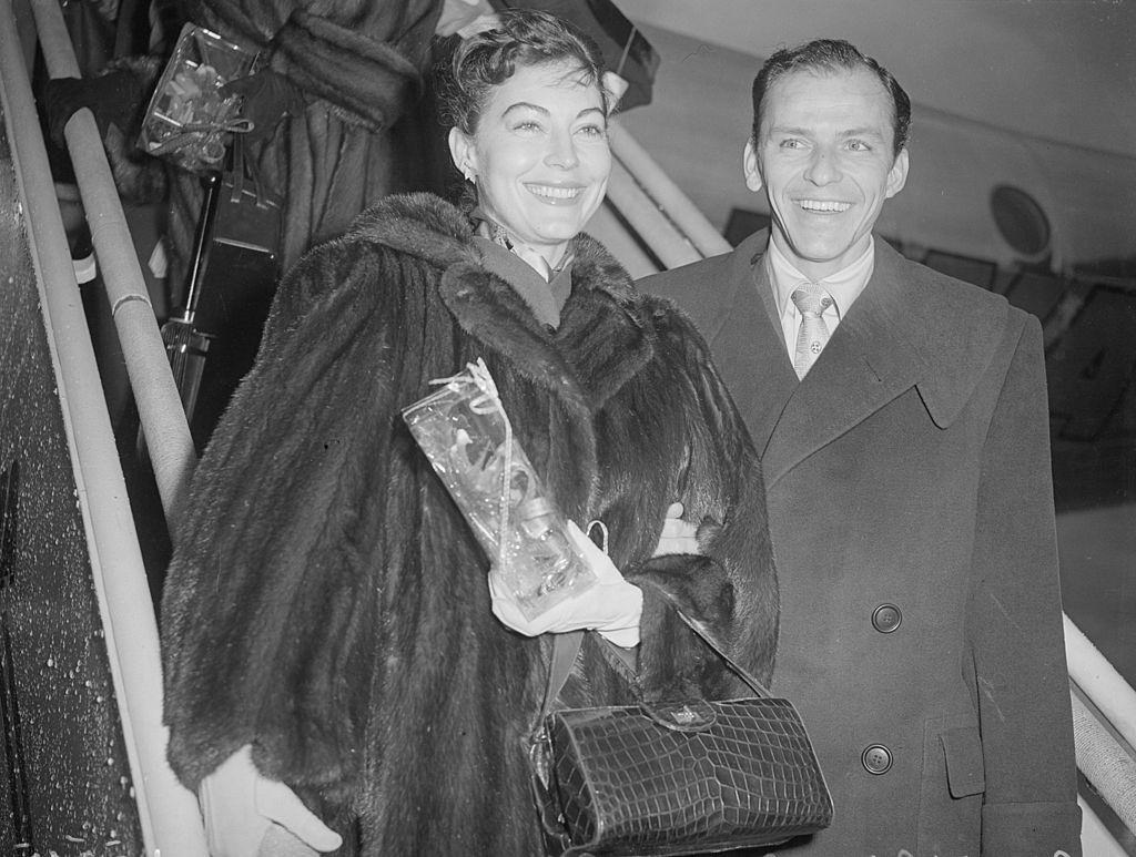 Frank Sinatra and Ava Gardner at the airport, 1950s.