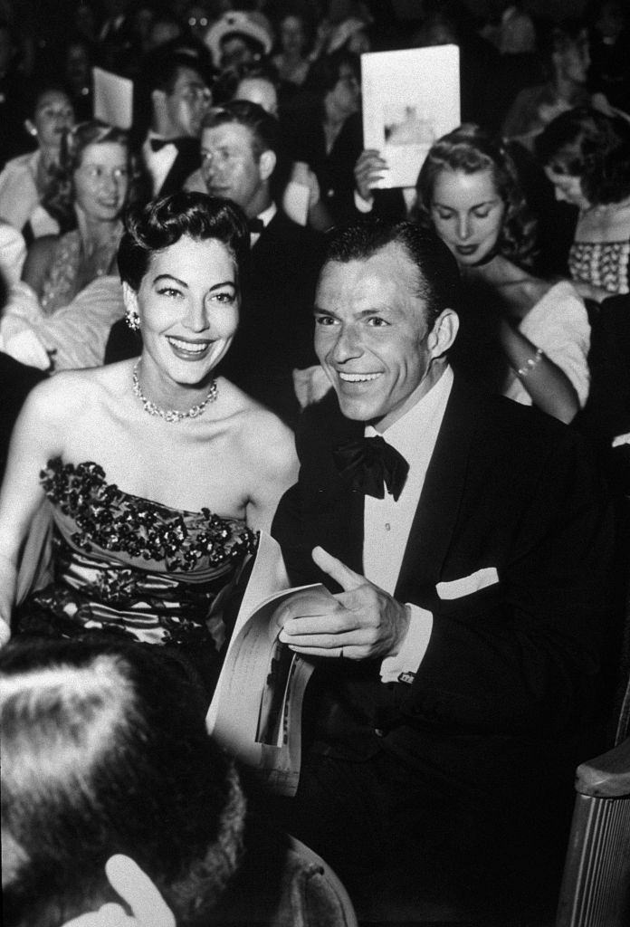 Frank Sinatra and Ava Gardner in a party.