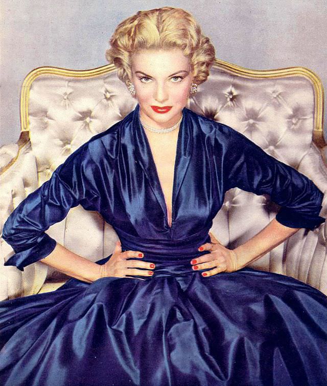 Kathleen Hughes wearing a luscious rustling taffeta dress