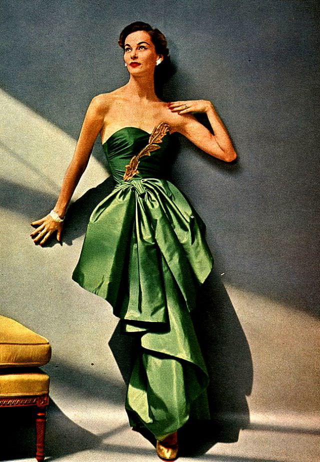 Model in a beautifully draped evening gown