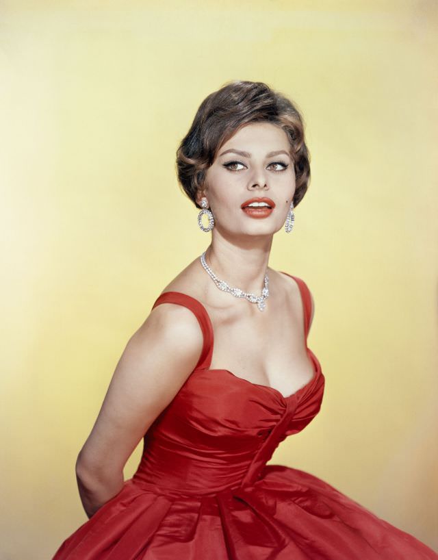 Sophia Loren in an elegant evening gown of red taffeta