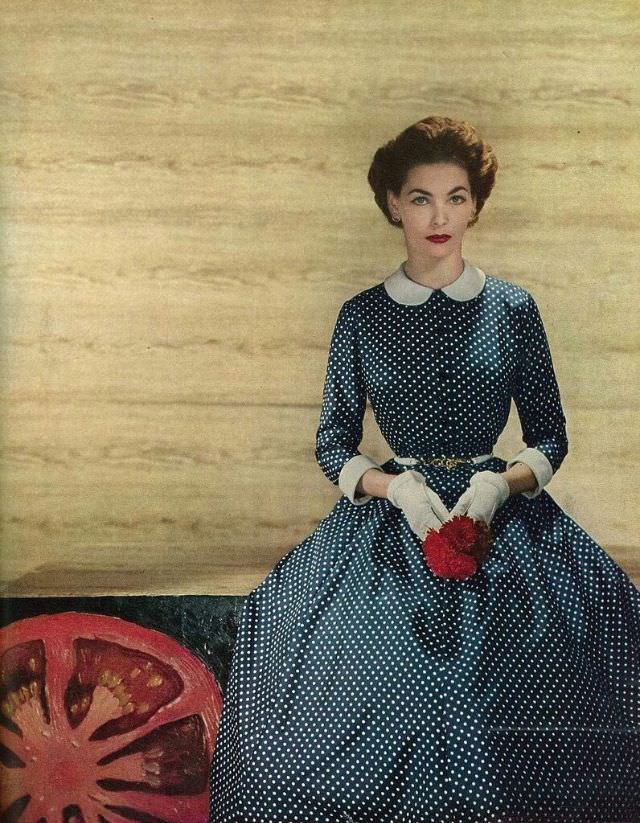Georgia Hamilton is wearing a charming polka dot print dress in silk taffeta for a photoshoot for Harper's Bazaar