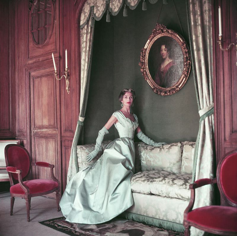 Jane Sprague models a taffeta evening gown by Jacques Fath