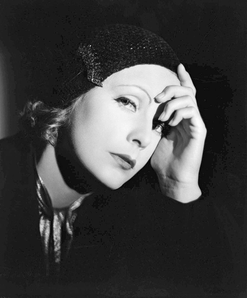 Greta Garbo wearing a black hat, 1928.