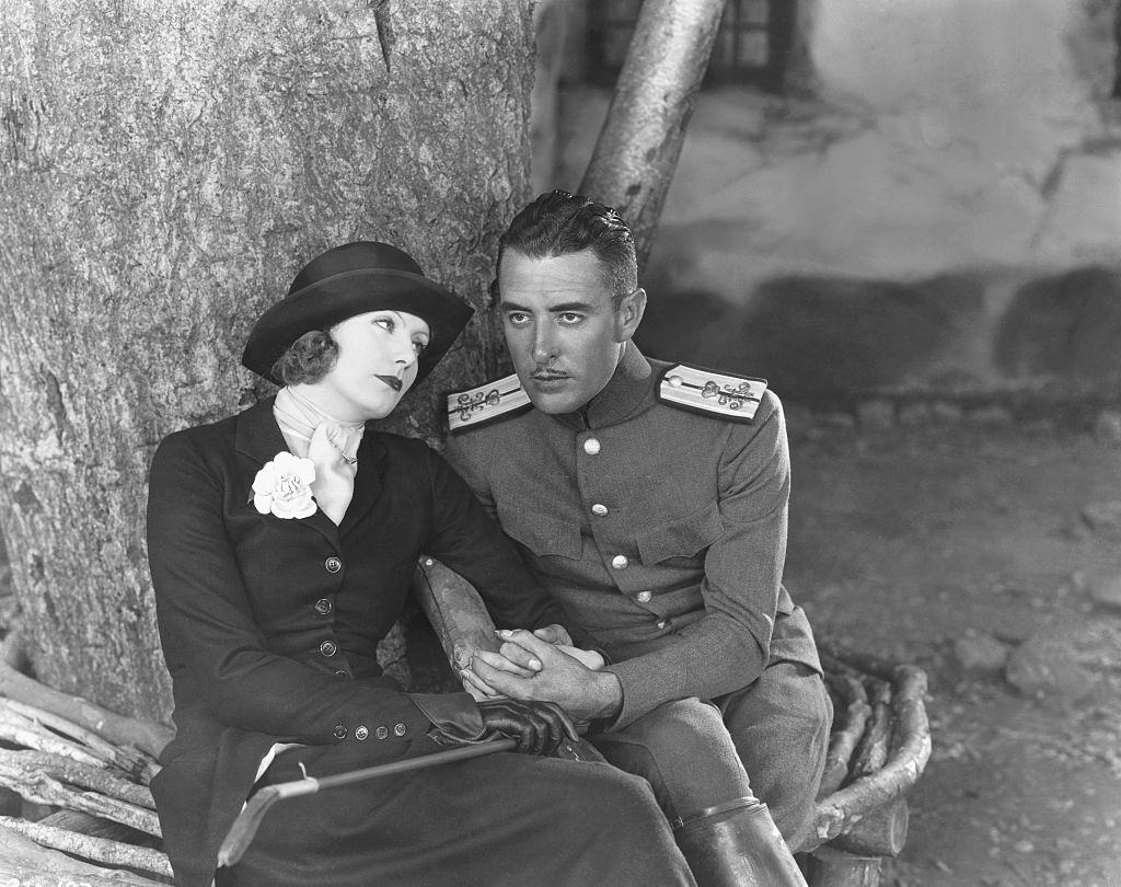 Greta Garbo with actor John Gilbert on the set of "Love".