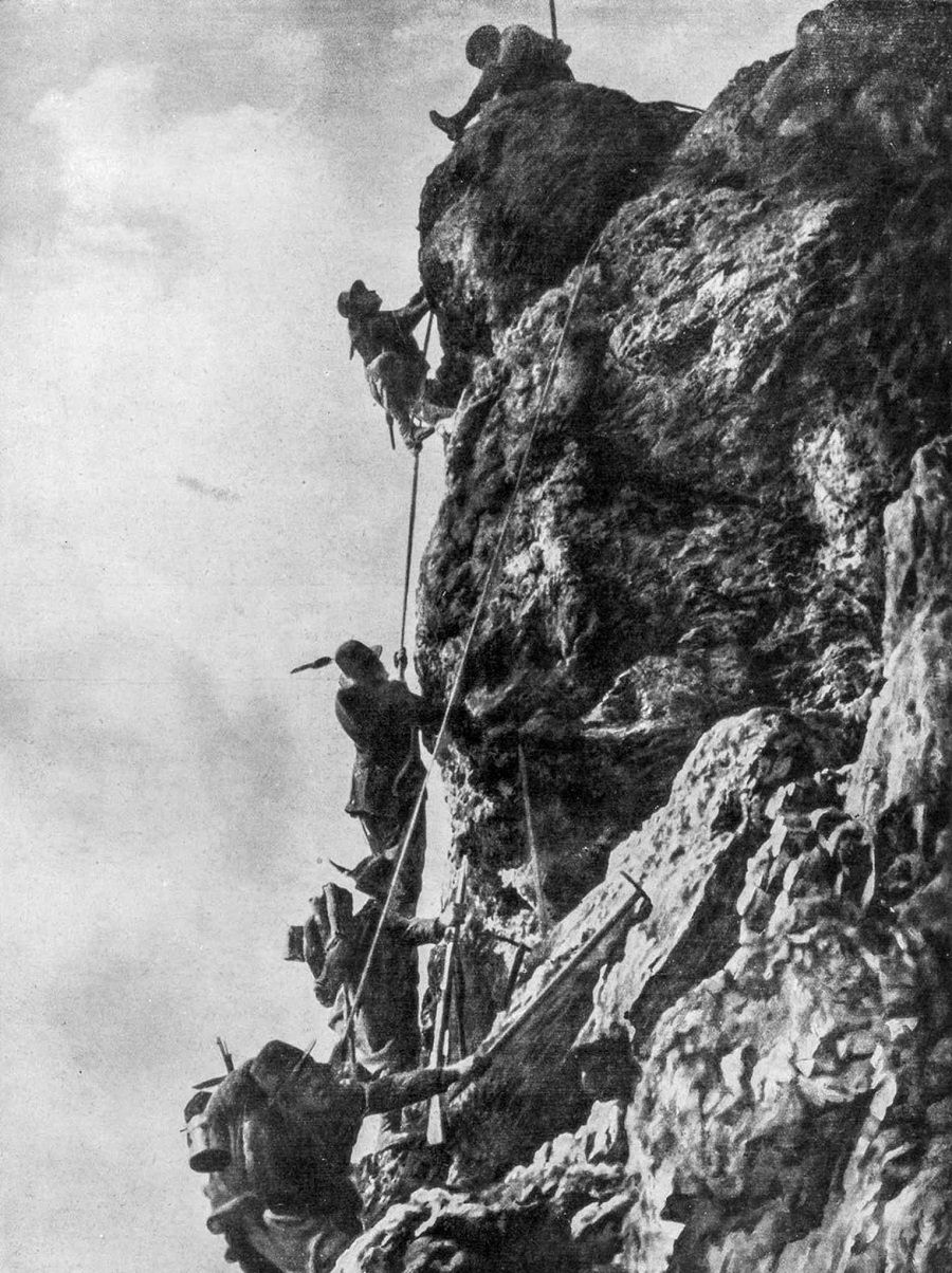Italian soldiers scale Monte Nero on the Karst plateau during the Second Battle of the Isonzo. 1915.