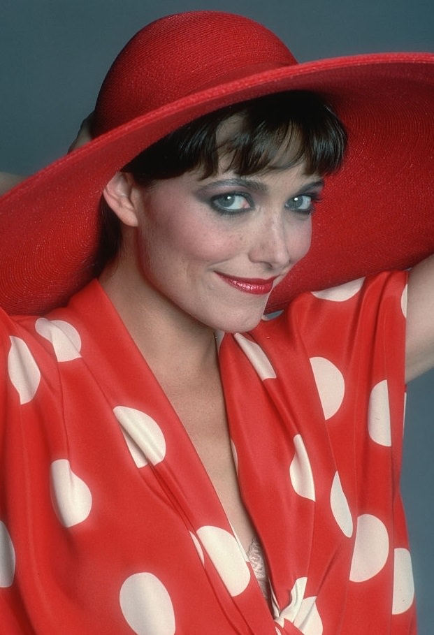 Karen Allen in red hat and dress, 1982.