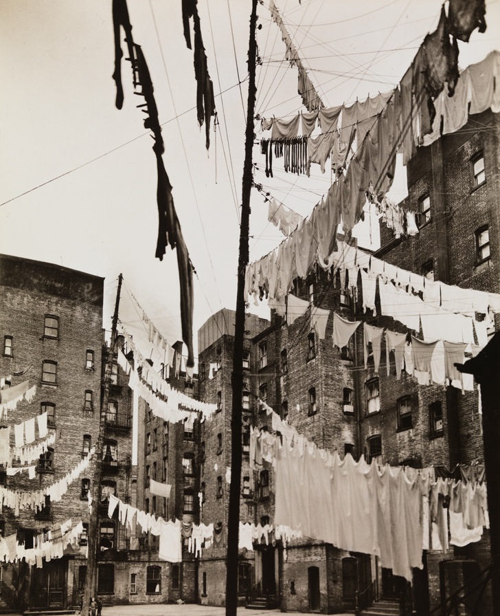 Court of the First Model Tenements in New York City. March 16, 1936. (Museum of the City of New York)