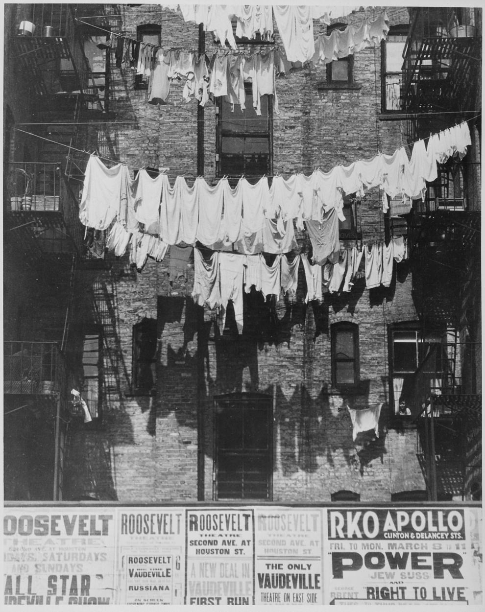 Rows of laundry outside a New York City apartment house, 1935. (U.S. National Archives and Records Administration)