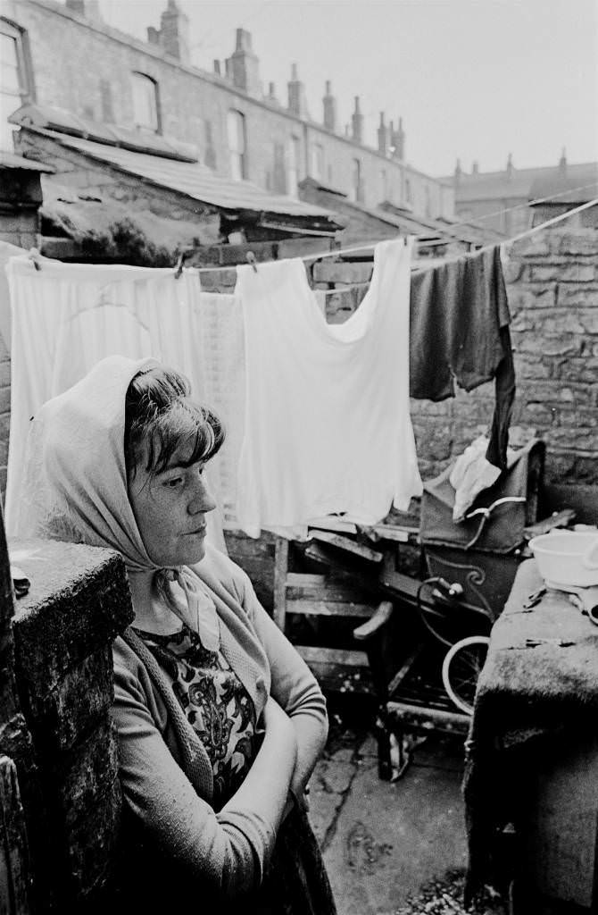 Housewife in backyard of Manchester terraced house, 1969