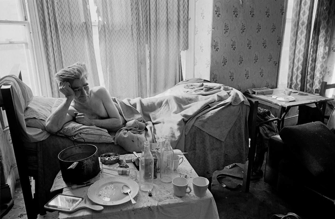 Single man living in one room of multi let house, Moss Side Manchester 1969