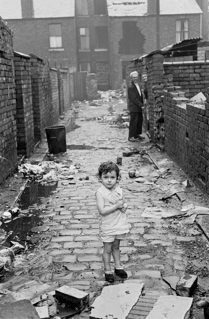 Child at end of alleyway, Manchester 1972