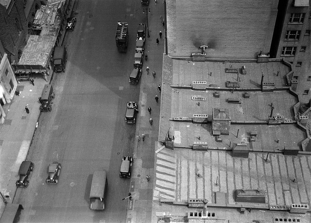 Looking down on rooftops, West 57th Street Between Sixth and Seventh Avenue, New York City, 1930.