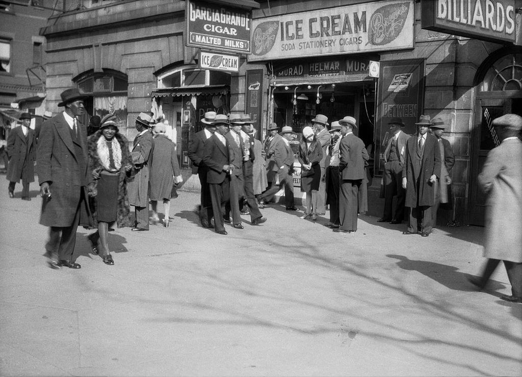 Pedestrians on Harlem Sidewalk, New York City, 1930.