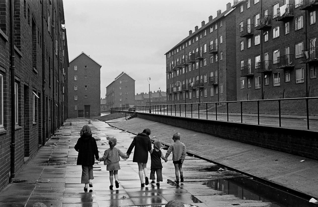 Children walking home on a council estate Newcastle upon Tyne 1972