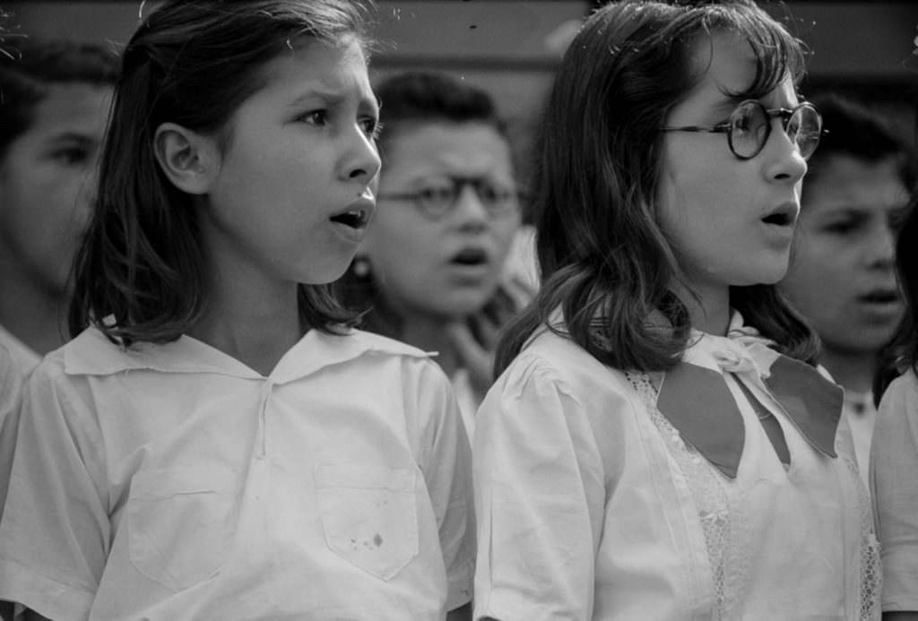 Members of a glee club sing during a party for FSA borrowers in Corozal.