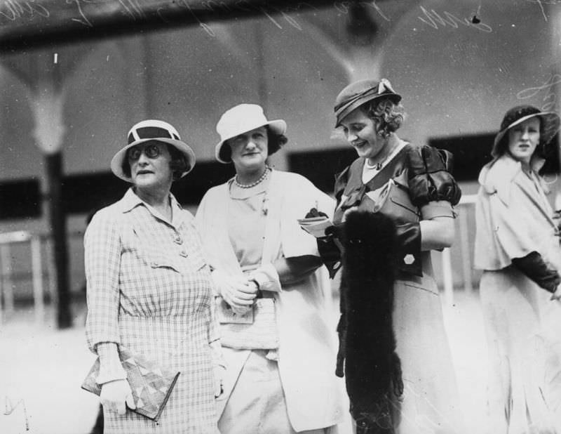 Checking the form guide at Ascot races, Brisbane, Queensland