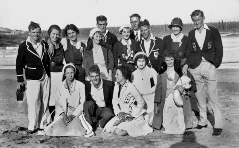 Group of young people socialising on the beach at Magnetic Island, Queensland