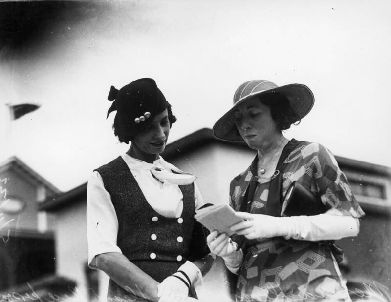 Two women picking a winner at the Ascot Races, Brisbane, Queensland