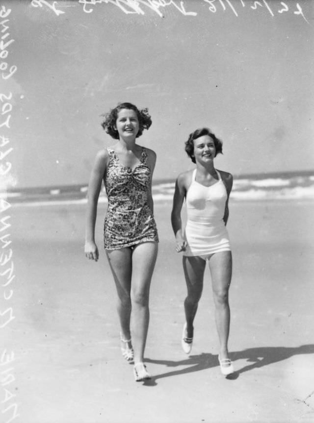 Two young beautiful ladies in swimsuits at Southport, Gold Coast, Queensland